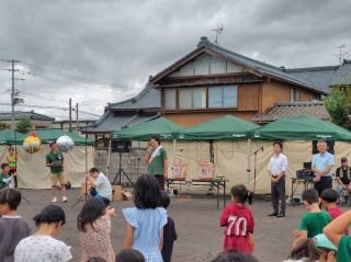 15周年記念式典で挨拶する鈴木実行委員長